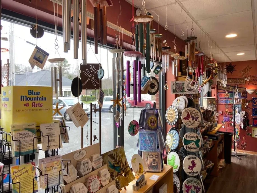 Wind chimes, crystals, and gifts inside the Uplifting Connections shop in Bridgewater, MA